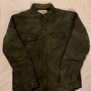 Camouflage quilted button up jacket. Very warm and light weight.